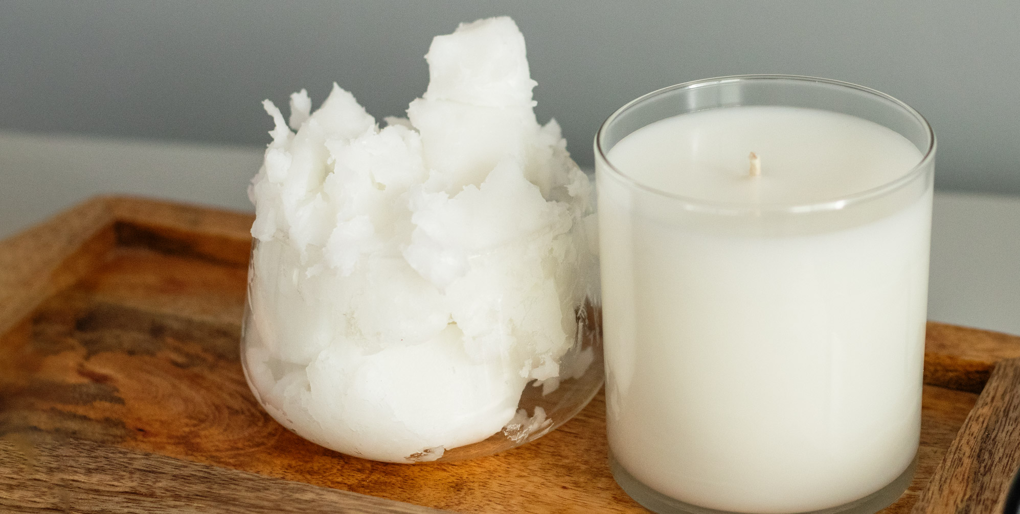  IGI 6046 coconut wax blend raw wax in cup next to a finished candle made from IGI 6046.